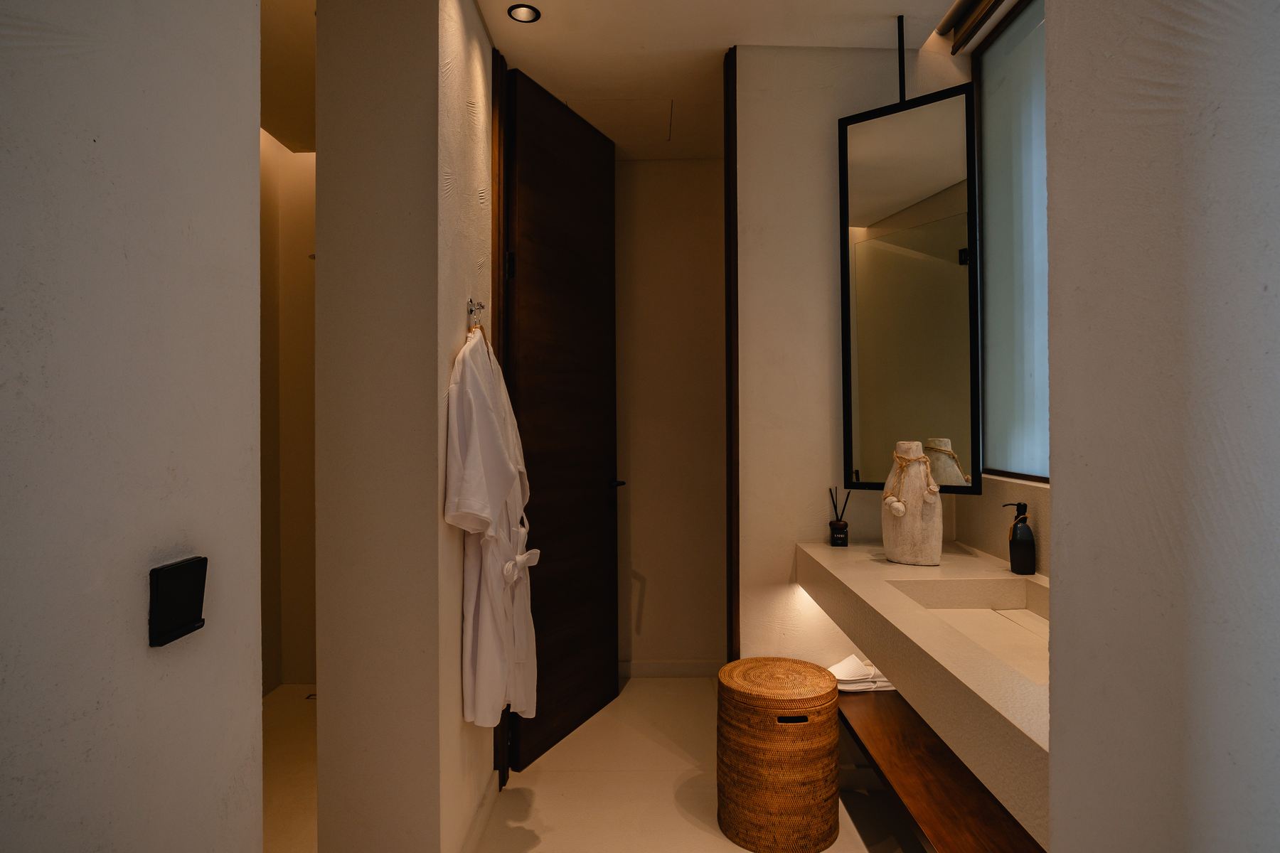 Bathroom vanity with hanging robe