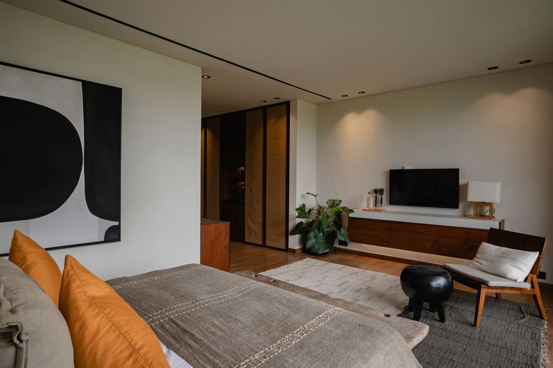 Bedroom seating and television wall