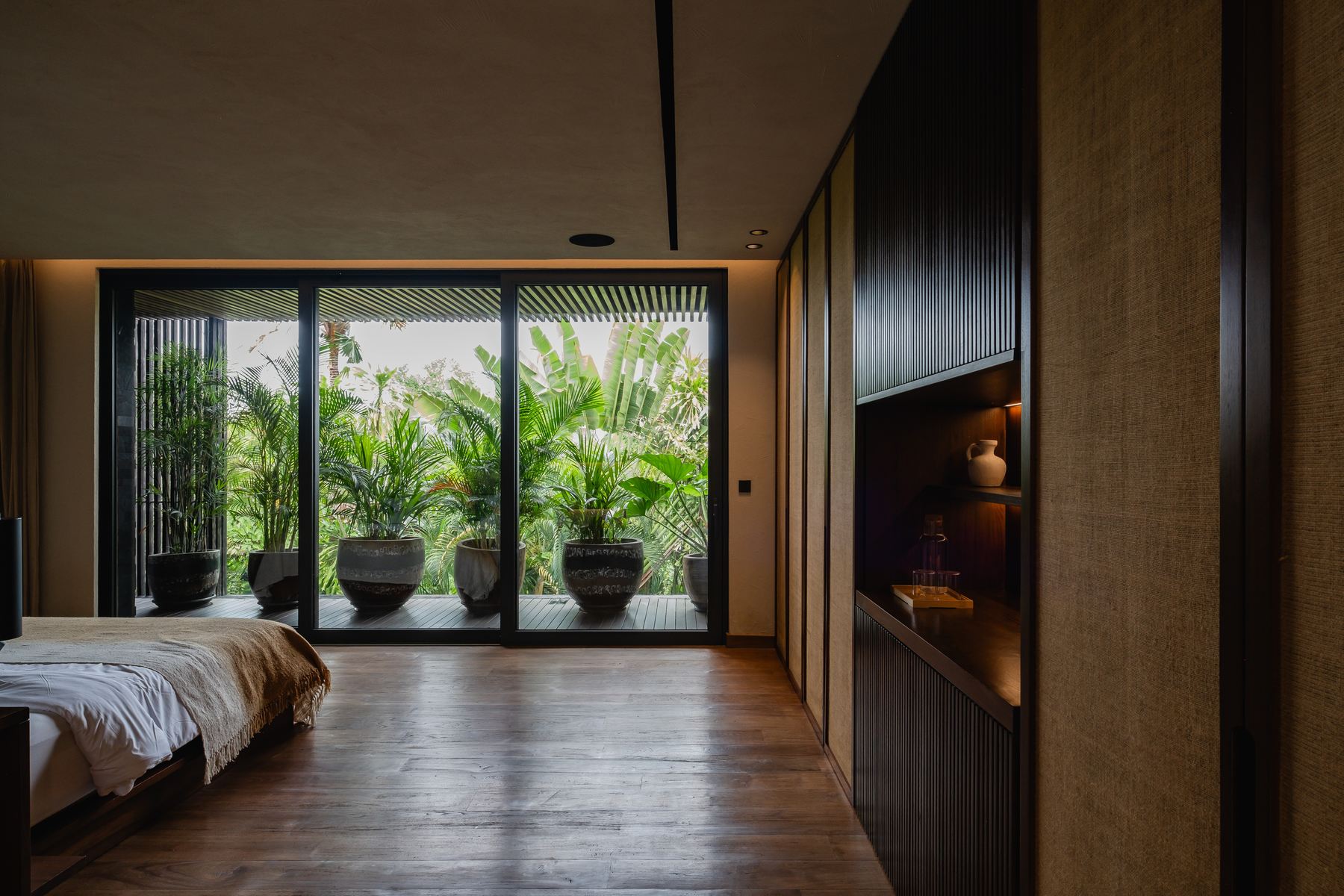 Bedroom doors onto planted deck