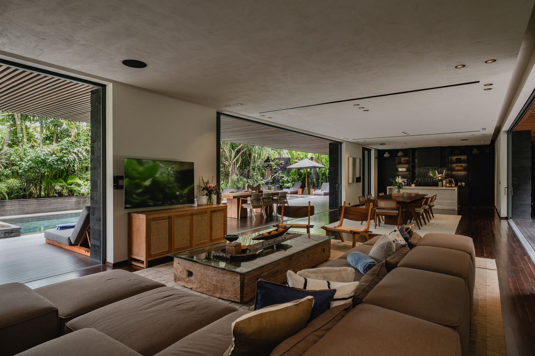 Living room open to pool